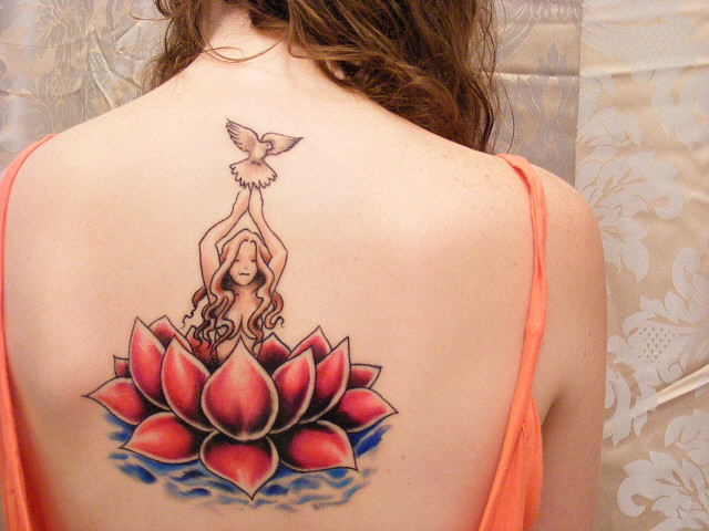  located in the back shoulders neck or upper Many of the lotus Tattoo 