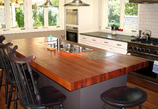 The chairs correspond to the kitchen, made by different color wood