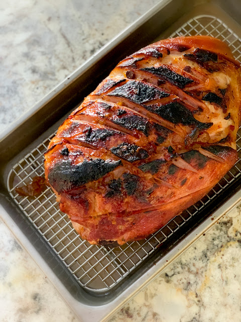 A Whole Bone In Ham recipe is so simple, with no glaze, no studding with cloves and no fuss.  The recipe uses the low and slow method of cooking and a blast of high heat at the end carmalizing the outside.  The results are excellent, juicy, tender, and superb flavor.