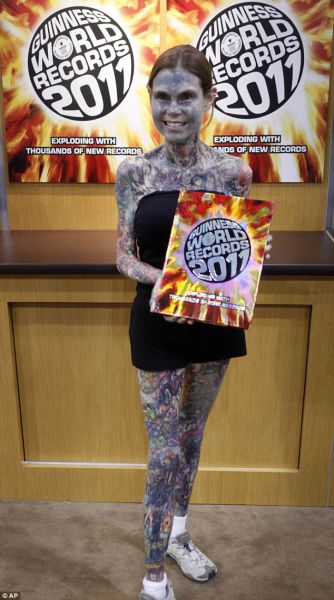 most tattooed woman. Julia Gnuse was known as the world#39;s most tattoeed woman, she also listed on the Guinness Book of records as Most tattoed woman in america where 95% of her