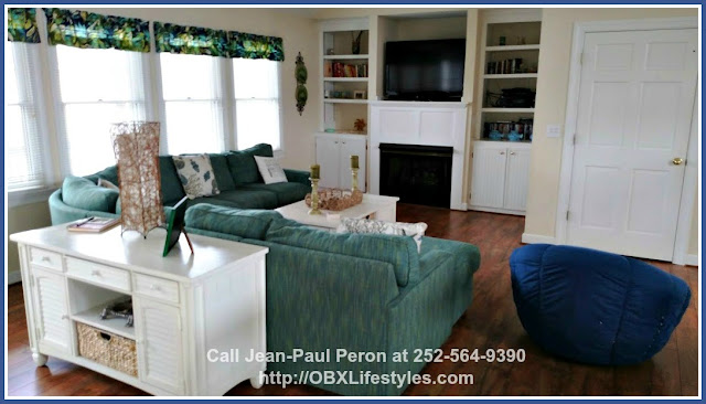 The neutral-colored walls of this Ocean Sands Outer Banks NC home for sale can perfectly accommodate any of your design preference. 