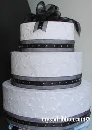 white and ribbon wedding cake