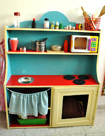 upcycled cupboard into children play kitchen