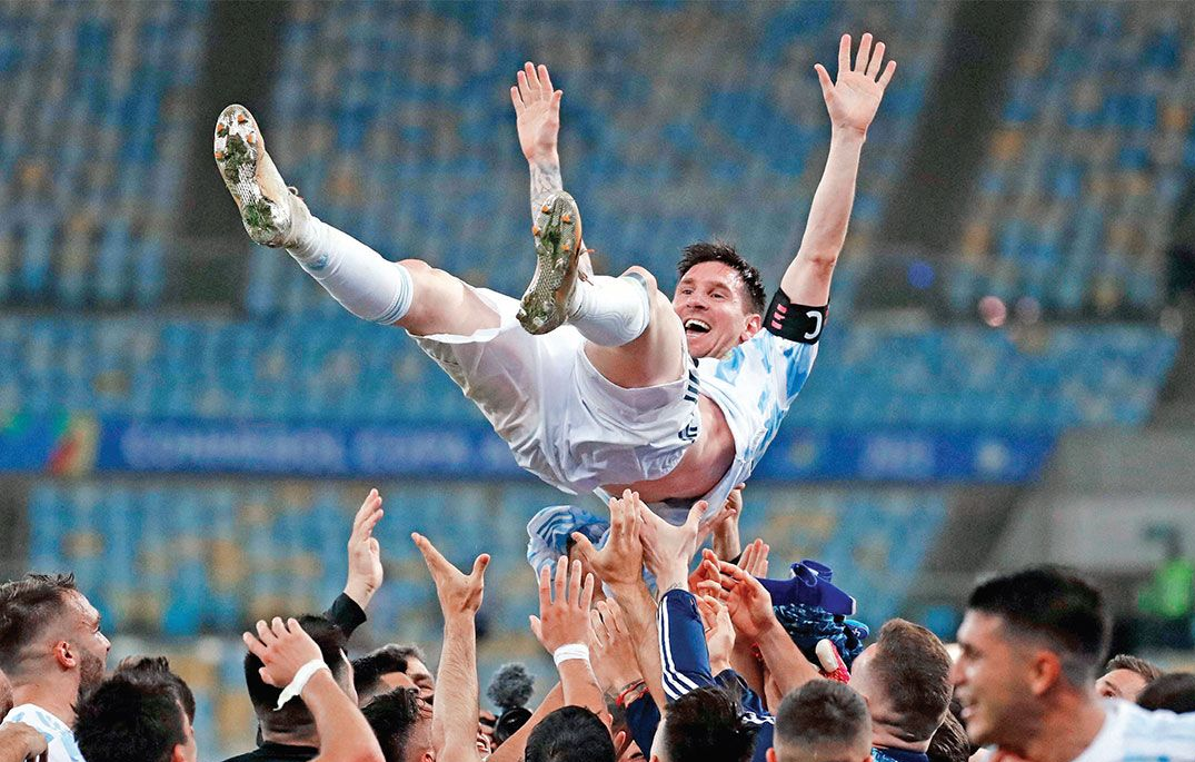 Messi celebrated by teammates after Copa America 2021 Finals win