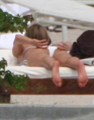 Aniston Bikini Pictures She Attempts The Jessica Alba Bikini Ass Pose