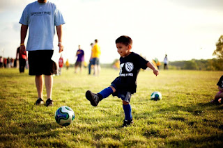 Boy play in football