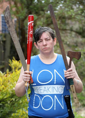 Four masked machete-wielding boys got the shock of their existence when they broke into ex-Thai boxer, Anji Rhys' home in Dunstable, Bedfordshire, mistaking it for a drug den. The self-proclaimed weapons fanatic reportedly reached for her crossbow nicknamed manstopper fired and hit one in the abdomen. Others scampered out leaving their friend.