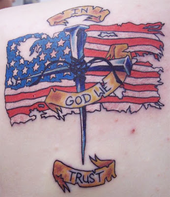 Cross of nails tattoo-tattered American flag-banner that says "In God we 