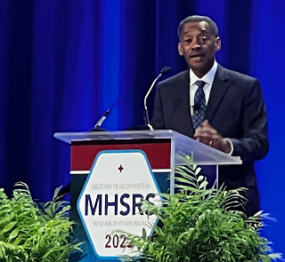 Dr. Jonathan Woodson, USU president, offers opening remarks during the MHSRS 2022 opening ceremony. (Photo credit: Sarah Marshall, USU)
