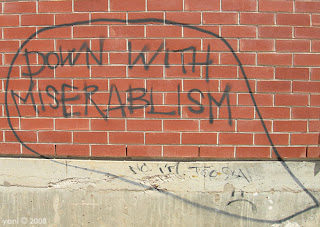 down with miserablism