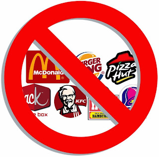 Fast food corporations with a restriction sign