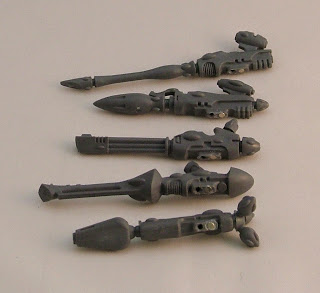 Weapons hold on with a magnet and a locator pin