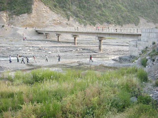 boys laying in water in Harnoi