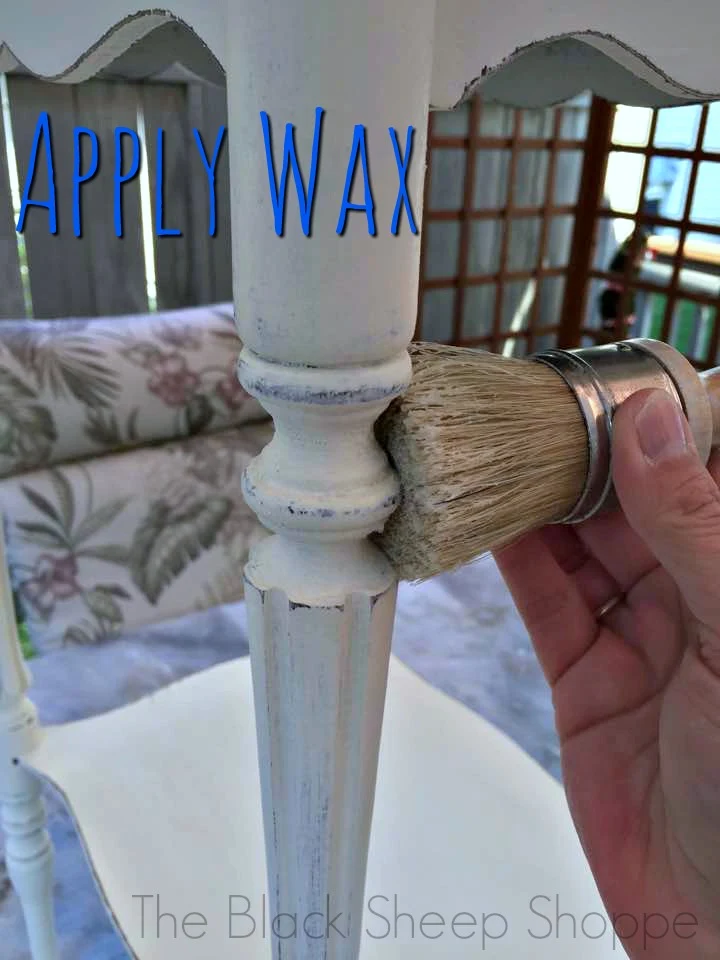 Applying wax with a wax brush.