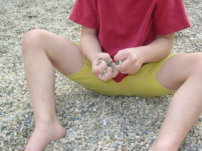 Photo of Joy's fists full of gravel