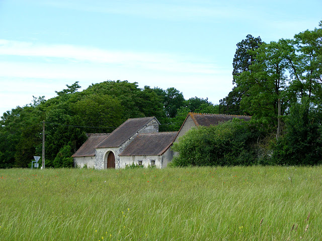 Gatehouse to Chateau de la Bernaudiere. Indre. France. Photographed by Susan Walter. Tour the Loire Valley with a classic car and a private guide.