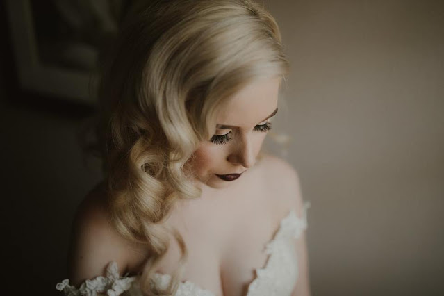 bride with curls and dark lips