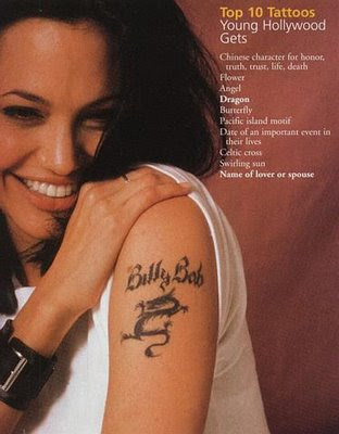 The cross tattoo that Angelina got before her wedding to Johnny Lee Miller, 