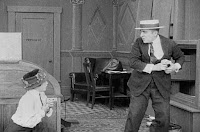 Кадр из фильма Чарли Чаплина The New Janitor (1914) - 7