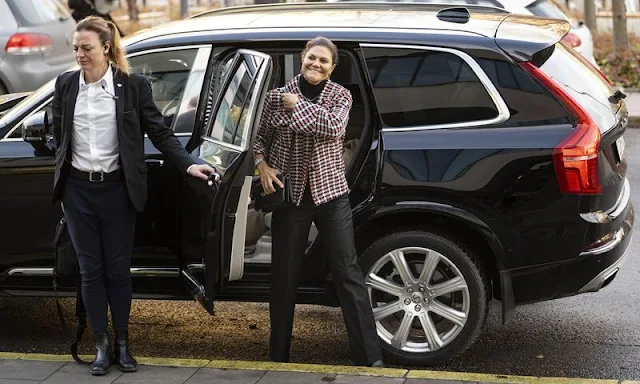 Crown Princess Victoria wore a Bronco houndstooth check recycled polyester blend jacket by Baum und Pferdgarten. Black trousers