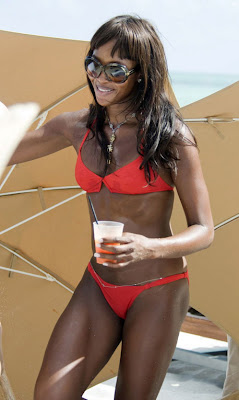 Naomi Campbell Hot In Orange Bikini photos