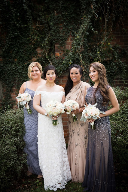 bridesmaids at Grosse Point Academy in front of ivory