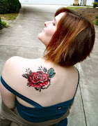 Rose flower tattoo is a most popular flower tattoo choice for girls. (rose flower tattoo for female upper back)