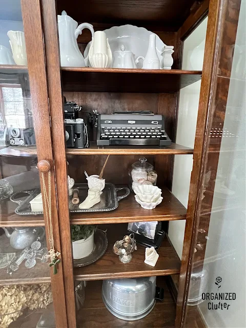 Living Room With Family Antiques & Thrifted Finds Photo of a living room decorated with family antiques and vintage collections.