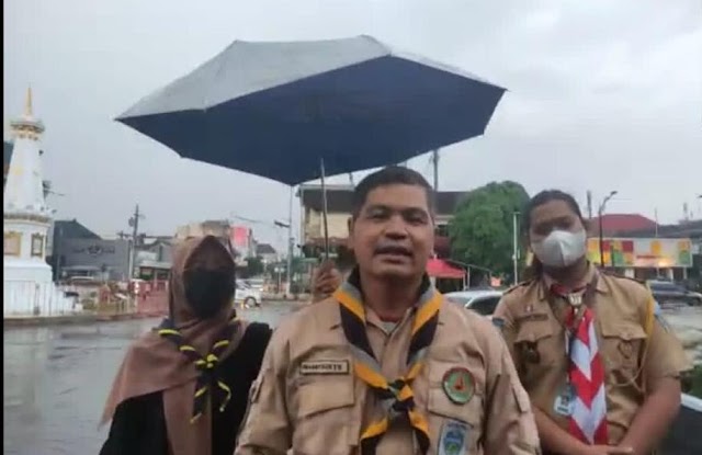  Tugu Yogyakarta di Guyur Hujan Deras Kala Mengikuti Penutupan KBL Kwartir Nasional