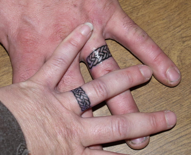 birdcage tattoo. wedding ring tattoos and