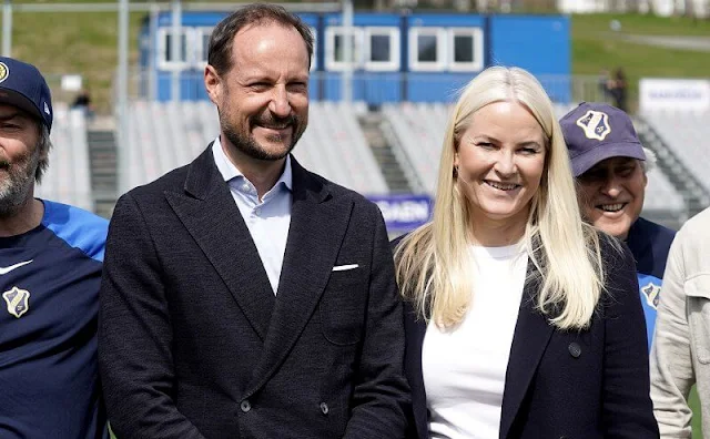 Crown Prince Haakon and Crown Princess Mette-Marit attended a street football match. Mette-Marit wore a navy blazer