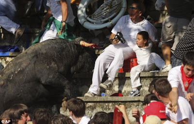 Man in a red England shirt get Weird Bull attack face to face Seen  On www.coolpicturegallery.net