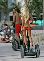Shauna Sand And Her Airbags On A Segway 