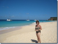 Tracy on beach at Tintemarre, Seabbatical on left