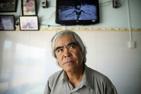 March 29, 2012, Trang Bang, Vietnam. AP agency photographer Nick Uth sits at home with the Kim Phuc's family, not far from the place where he made his main shot 40 years ago.