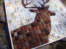 Reverse applique deer quilt