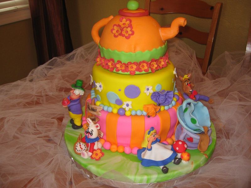 Elegant Mad Hatter Cake wedding cake in purple orange and white