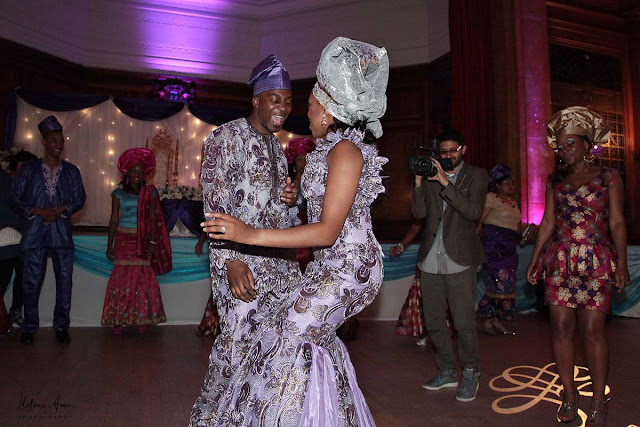 bride and groom dancing and wearing traditional african outfits at Porchester Hall wedding