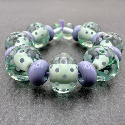 Handmade lampwork glass polka dot beads by Laura Sparling