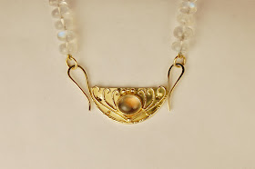 Rainbow moonstone clasp in Boston and Cambridge