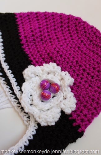 purple hat with flower