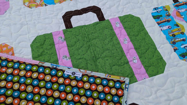 Suitcases quilt made with Drivin' Down 9 fabric