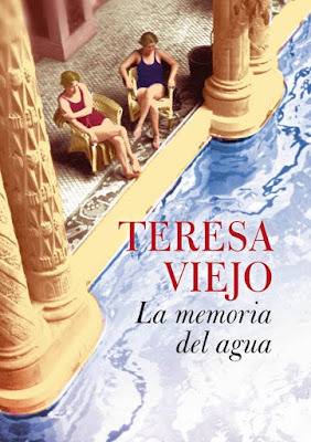 Portada de la novela histórica de Teresa Viejo La Memoria del Agua, con dos mujeres sentadas junto a la piscina de un balneario