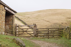 Walking Ladybower reservoir in the Peak District in Winter