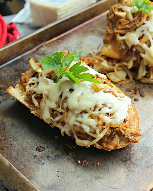 http://chelseasmessyapron.com/sweet-pulled-pork-french-bread-pizza/