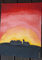  'Catan', 2013 - the picture shows a sundown, in red, orange and yellow, in front you see the silhouette of a town, just like Catan (Boardgame)