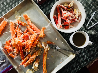 Photo of cracked crab legs, coffee with Irish Cream