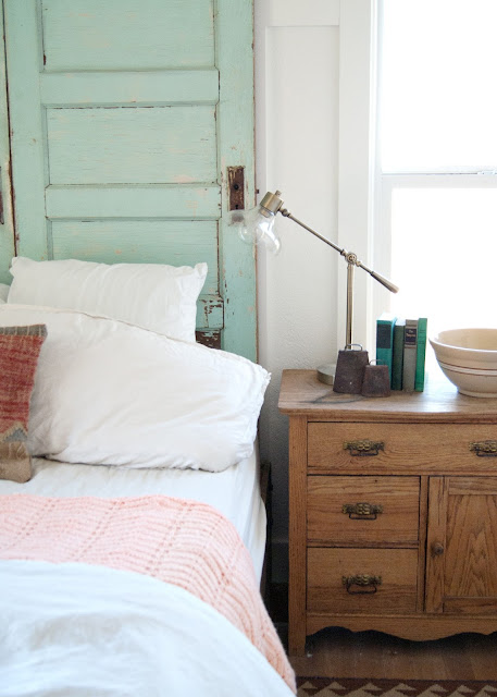 Farmhouse Master Bedroom Reveal - Benjamin Moore Simply White, antique wash stand, glass shade pharmacy lamp, crosby lamp, target