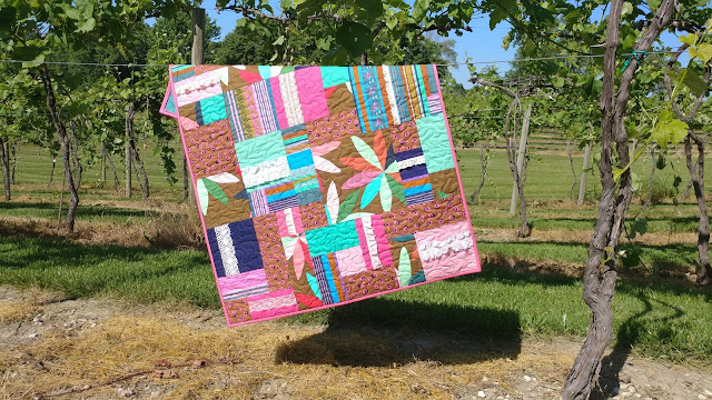 Boho Chic baby quilt with Anna Maria Horner fabrics and vintage lace