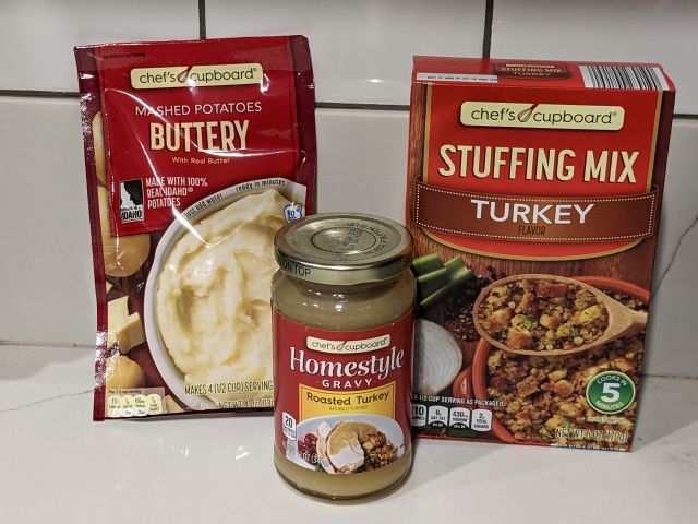 Aldi mashed potato, gravy, and stuffing packaging.